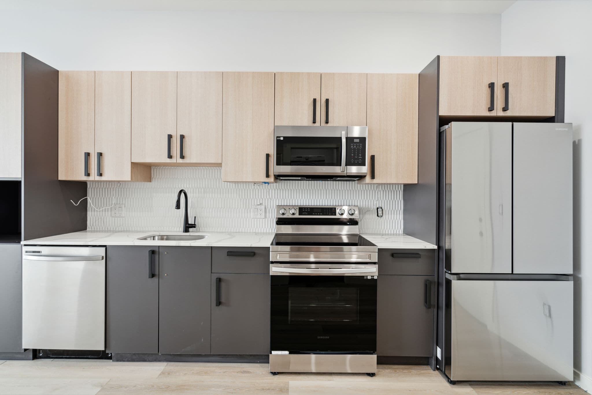 Minimalist kitchen with stone counters